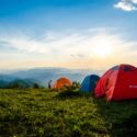 Three tents on a mountain top