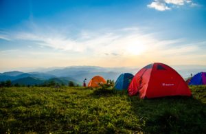 Three tents on a mountain top
